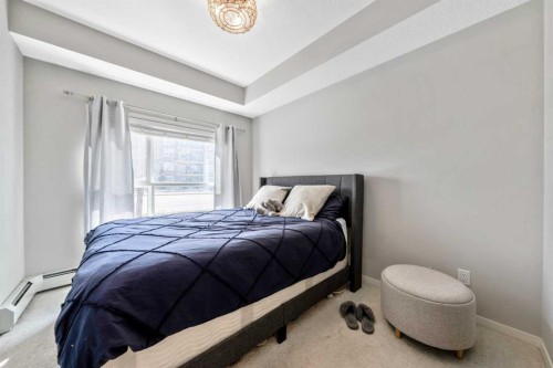 117-4150 Seton Drive Se, Calgary, AB - Indoor Photo Showing Bedroom