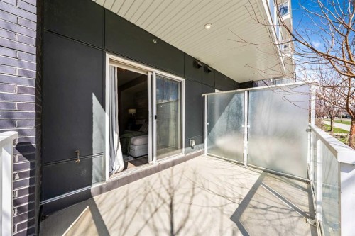 117-4150 Seton Drive Se, Calgary, AB - Outdoor With Deck Patio Veranda With Exterior