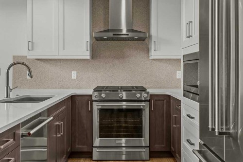 401-1505 Spring Creek Gate, Canmore, AB - Indoor Photo Showing Kitchen With Upgraded Kitchen
