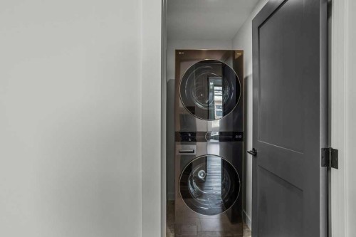 401-1505 Spring Creek Gate, Canmore, AB - Indoor Photo Showing Laundry Room
