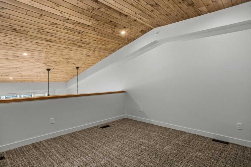 401-1505 Spring Creek Gate, Canmore, AB - Indoor Photo Showing Other Room