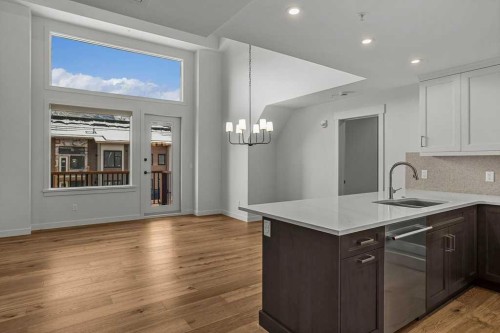 401-1505 Spring Creek Gate, Canmore, AB - Indoor Photo Showing Kitchen