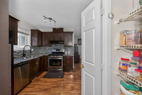 119 Taravista Drive Ne, Calgary, AB - Indoor Photo Showing Kitchen With Double Sink With Upgraded Kitchen