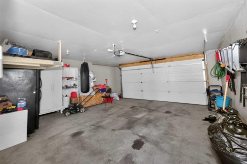 119 Taravista Drive Ne, Calgary, AB - Indoor Photo Showing Garage
