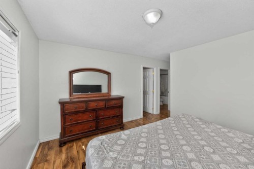 119 Taravista Drive Ne, Calgary, AB - Indoor Photo Showing Bedroom
