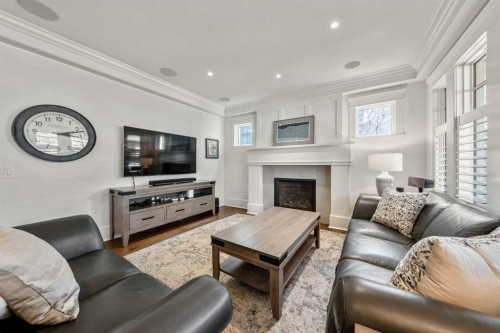 2022 32 Avenue Sw, Calgary, AB - Indoor Photo Showing Living Room With Fireplace