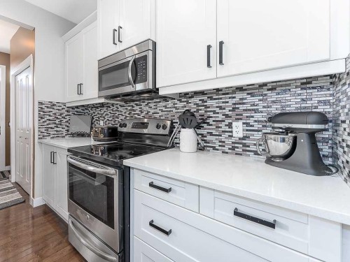 608 Evansborough Way Nw, Calgary, AB - Indoor Photo Showing Kitchen With Upgraded Kitchen