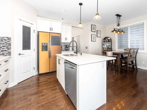 608 Evansborough Way Nw, Calgary, AB - Indoor Photo Showing Kitchen With Upgraded Kitchen