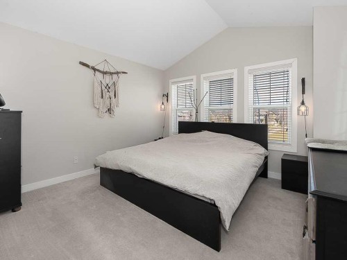 608 Evansborough Way Nw, Calgary, AB - Indoor Photo Showing Bedroom