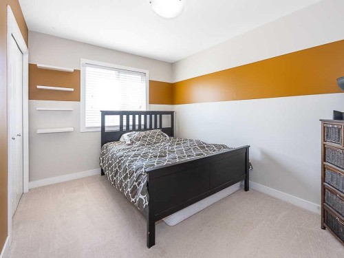 608 Evansborough Way Nw, Calgary, AB - Indoor Photo Showing Bedroom