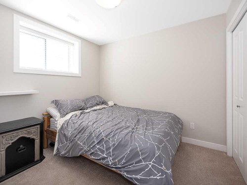 608 Evansborough Way Nw, Calgary, AB - Indoor Photo Showing Bedroom