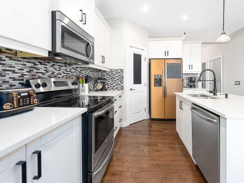 608 Evansborough Way Nw, Calgary, AB - Indoor Photo Showing Kitchen With Upgraded Kitchen