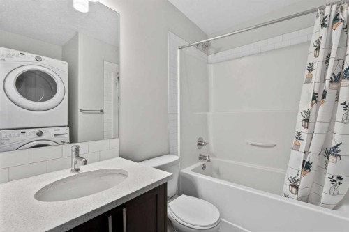 12 Evanscrest Gardens Nw, Calgary, AB - Indoor Photo Showing Laundry Room