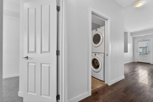 12 Evanscrest Gardens Nw, Calgary, AB - Indoor Photo Showing Laundry Room