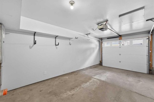 12 Evanscrest Gardens Nw, Calgary, AB - Indoor Photo Showing Garage