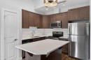 12 Evanscrest Gardens Nw, Calgary, AB  - Indoor Photo Showing Kitchen With Upgraded Kitchen 