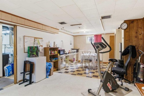 200 Hendon Drive Nw, Calgary, AB - Indoor Photo Showing Gym Room