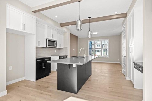 376 Sora Boulevard Se, Calgary, AB - Indoor Photo Showing Kitchen With Upgraded Kitchen