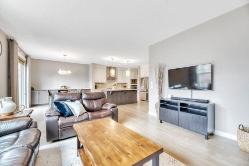 143 Stonemere Green, Chestermere, AB - Indoor Photo Showing Living Room