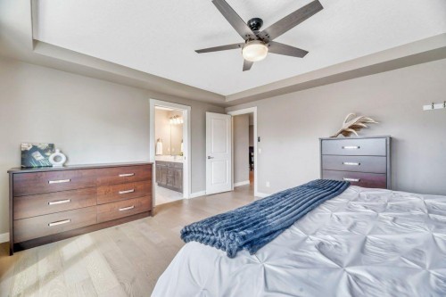 143 Stonemere Green, Chestermere, AB - Indoor Photo Showing Bedroom