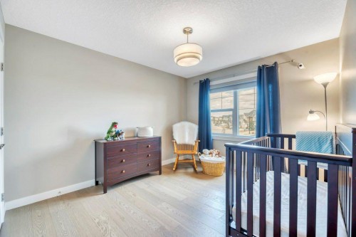 143 Stonemere Green, Chestermere, AB - Indoor Photo Showing Bedroom