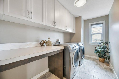 143 Stonemere Green, Chestermere, AB - Indoor Photo Showing Laundry Room