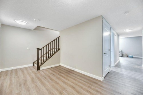 143 Stonemere Green, Chestermere, AB - Indoor Photo Showing Other Room