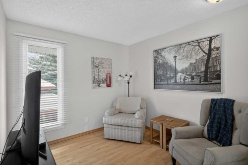28 Deercross Way Se, Calgary, AB - Indoor Photo Showing Living Room