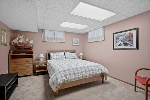 28 Deercross Way Se, Calgary, AB - Indoor Photo Showing Bedroom