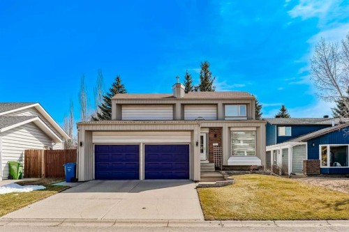 28 Deercross Way Se, Calgary, AB - Outdoor With Facade