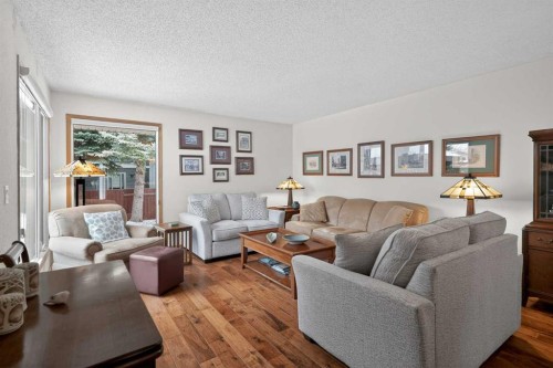28 Deercross Way Se, Calgary, AB - Indoor Photo Showing Living Room