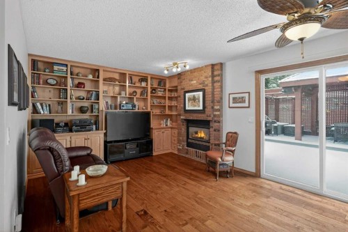 28 Deercross Way Se, Calgary, AB - Indoor With Fireplace