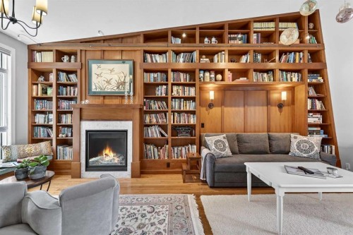 8932 Baylor Crescent Sw, Calgary, AB - Indoor Photo Showing Living Room With Fireplace
