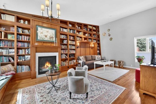 8932 Baylor Crescent Sw, Calgary, AB - Indoor Photo Showing Living Room With Fireplace