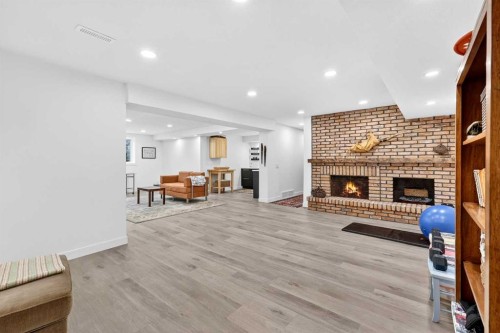 8932 Baylor Crescent Sw, Calgary, AB - Indoor With Fireplace