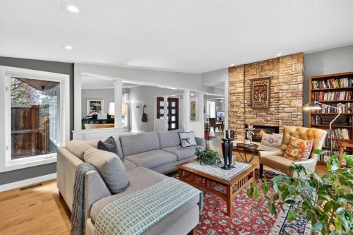 8932 Baylor Crescent Sw, Calgary, AB - Indoor Photo Showing Living Room With Fireplace