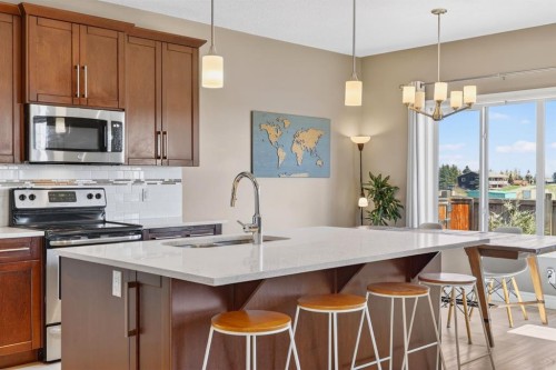 1612 Monteith Drive Se, High River, AB - Indoor Photo Showing Kitchen With Upgraded Kitchen