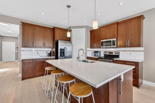 1612 Monteith Drive Se, High River, AB - Indoor Photo Showing Kitchen With Double Sink