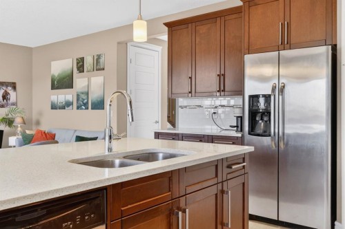 1612 Monteith Drive Se, High River, AB - Indoor Photo Showing Kitchen With Double Sink