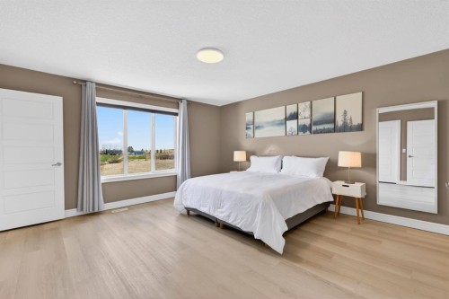 1612 Monteith Drive Se, High River, AB - Indoor Photo Showing Bedroom