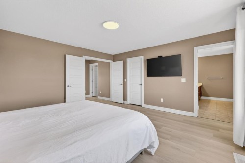 1612 Monteith Drive Se, High River, AB - Indoor Photo Showing Bedroom
