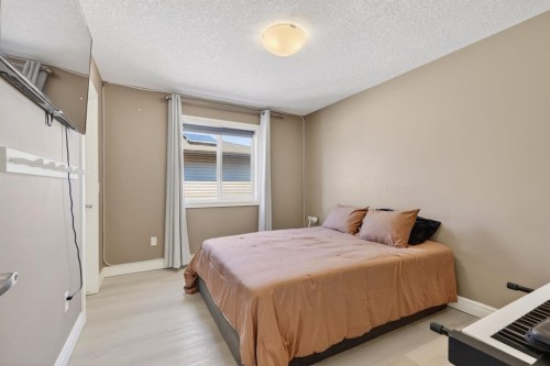 1612 Monteith Drive Se, High River, AB - Indoor Photo Showing Bedroom