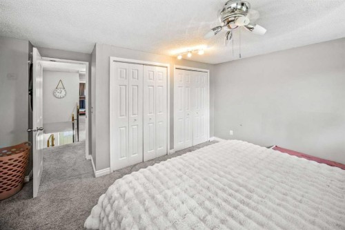 96 Mckinley Road Se, Calgary, AB - Indoor Photo Showing Bedroom