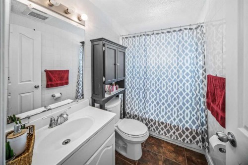 96 Mckinley Road Se, Calgary, AB - Indoor Photo Showing Bathroom