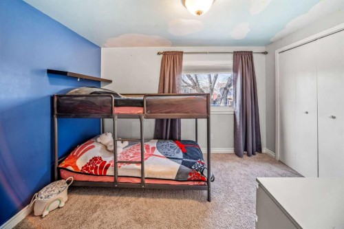 96 Mckinley Road Se, Calgary, AB - Indoor Photo Showing Bedroom