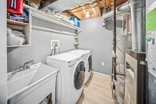 96 Mckinley Road Se, Calgary, AB - Indoor Photo Showing Laundry Room