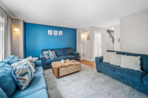96 Mckinley Road Se, Calgary, AB - Indoor Photo Showing Living Room