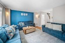 96 Mckinley Road Se, Calgary, AB  - Indoor Photo Showing Living Room 