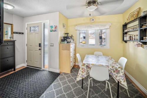 96 Mckinley Road Se, Calgary, AB - Indoor Photo Showing Dining Room