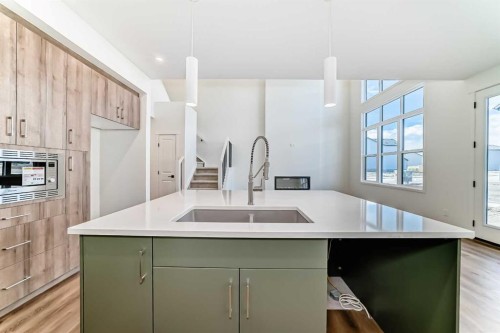 61 Bartlett Way Se, Calgary, AB - Indoor Photo Showing Kitchen With Double Sink With Upgraded Kitchen